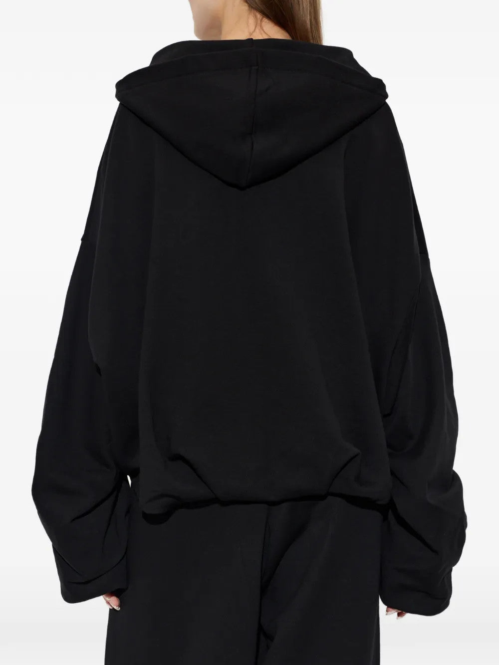 Black knitwear, full body view