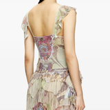 Brown knitwear worn by a person, showing the knitwear's fit