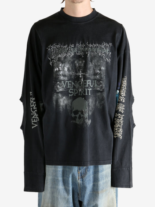 Black shirt worn by a person, showing the shirt fit