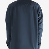 Navy jacket worn by a person, showing the jacket's fit