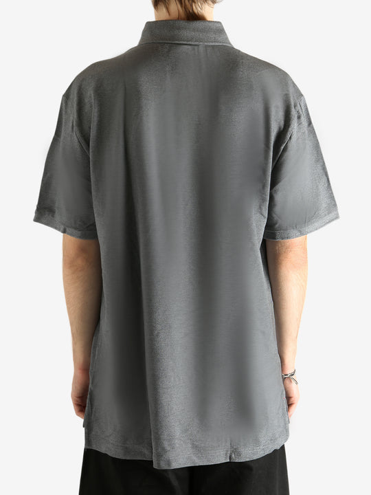 Grey T-shirt worn by a person, showing the T-shirt's fit