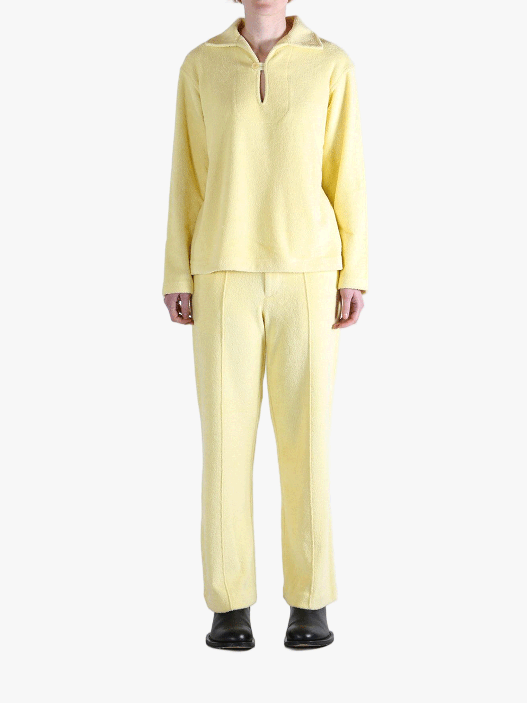 Yellow shirt worn by a person, showing the shirt's fit