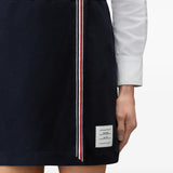 Navy skirt worn by a person, showing the skirt fit