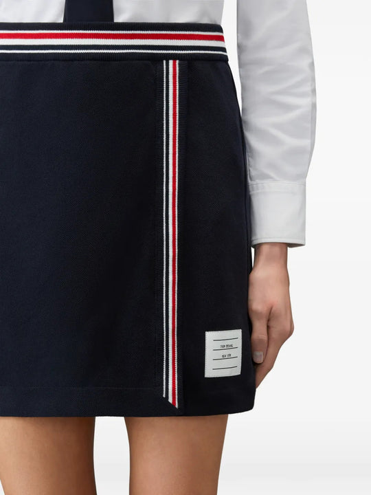 Navy skirt worn by a person, showing the skirt fit