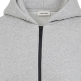 Close up of grey hoodies, showing texture of the organic cotton fabric