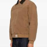 Brown jacket worn by a person, showing the jacket fit
