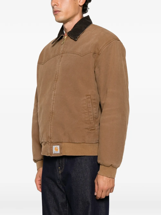 Brown jacket worn by a person, showing the jacket fit