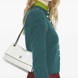 White bags worn by a person, showing the bags fit