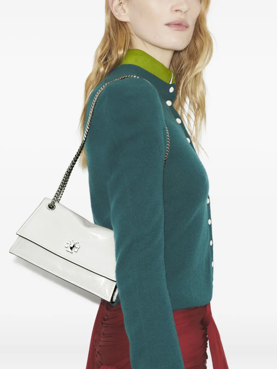 White bags worn by a person, showing the bags fit