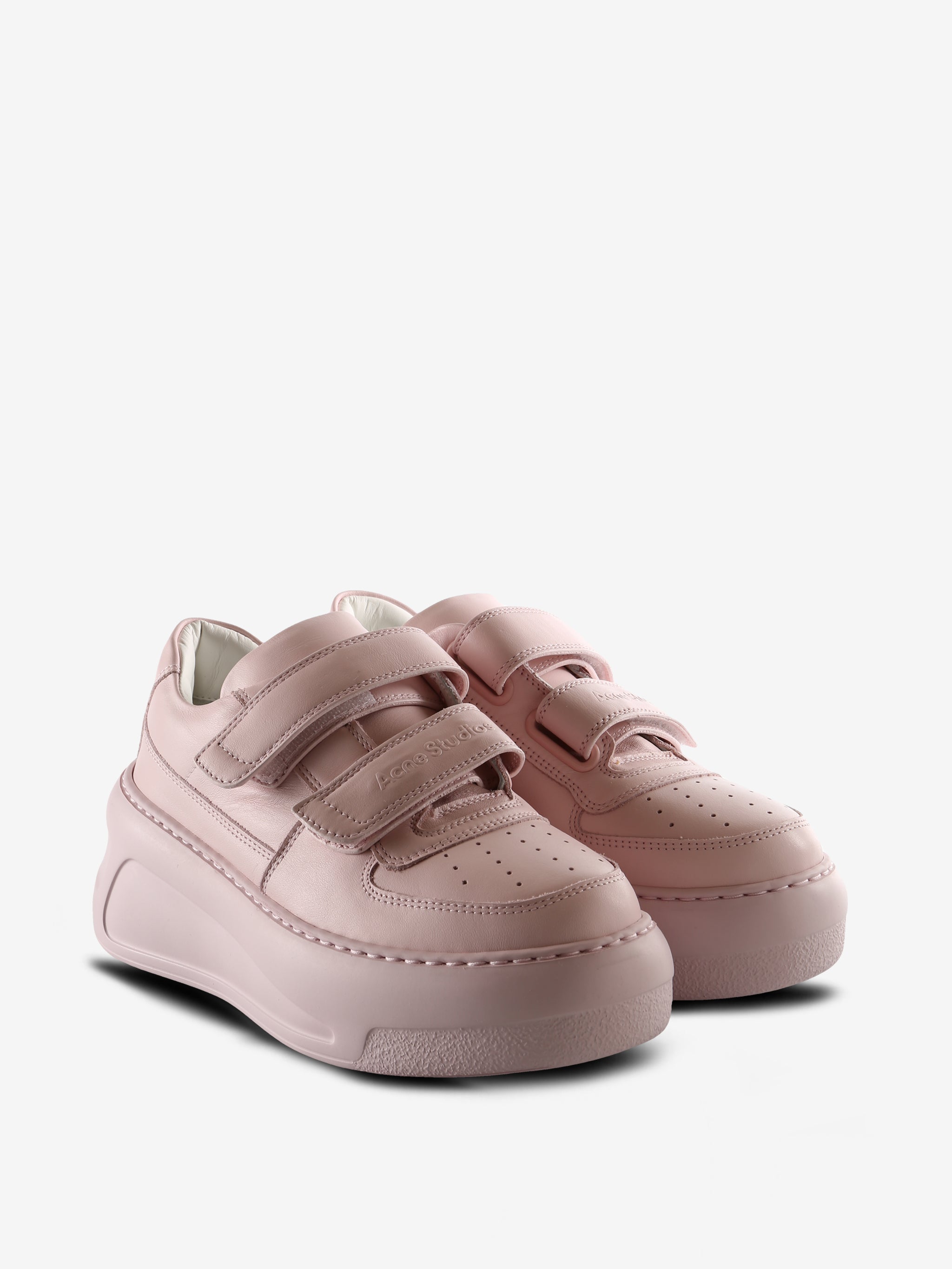 Pink sneakers, side view