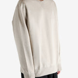 Tan shirts worn by a person, showing the shirts fit