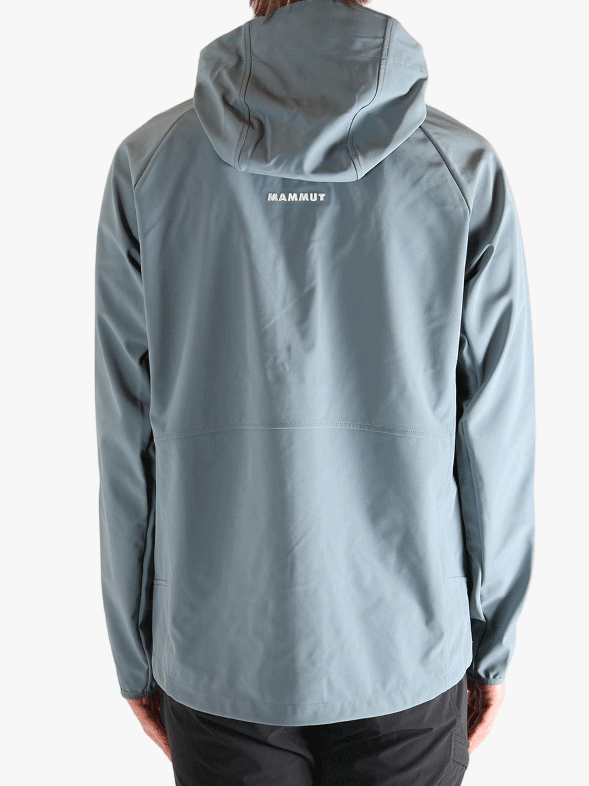 Blue jacket worn by a person, showing the jacket's fit