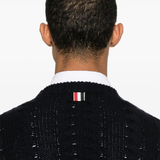 Close up of navy kintwear, showing texture of the virgin wool and wool and polyamide fabric