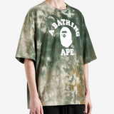Green t-shirt worn by a person, showing the t-shirt fit