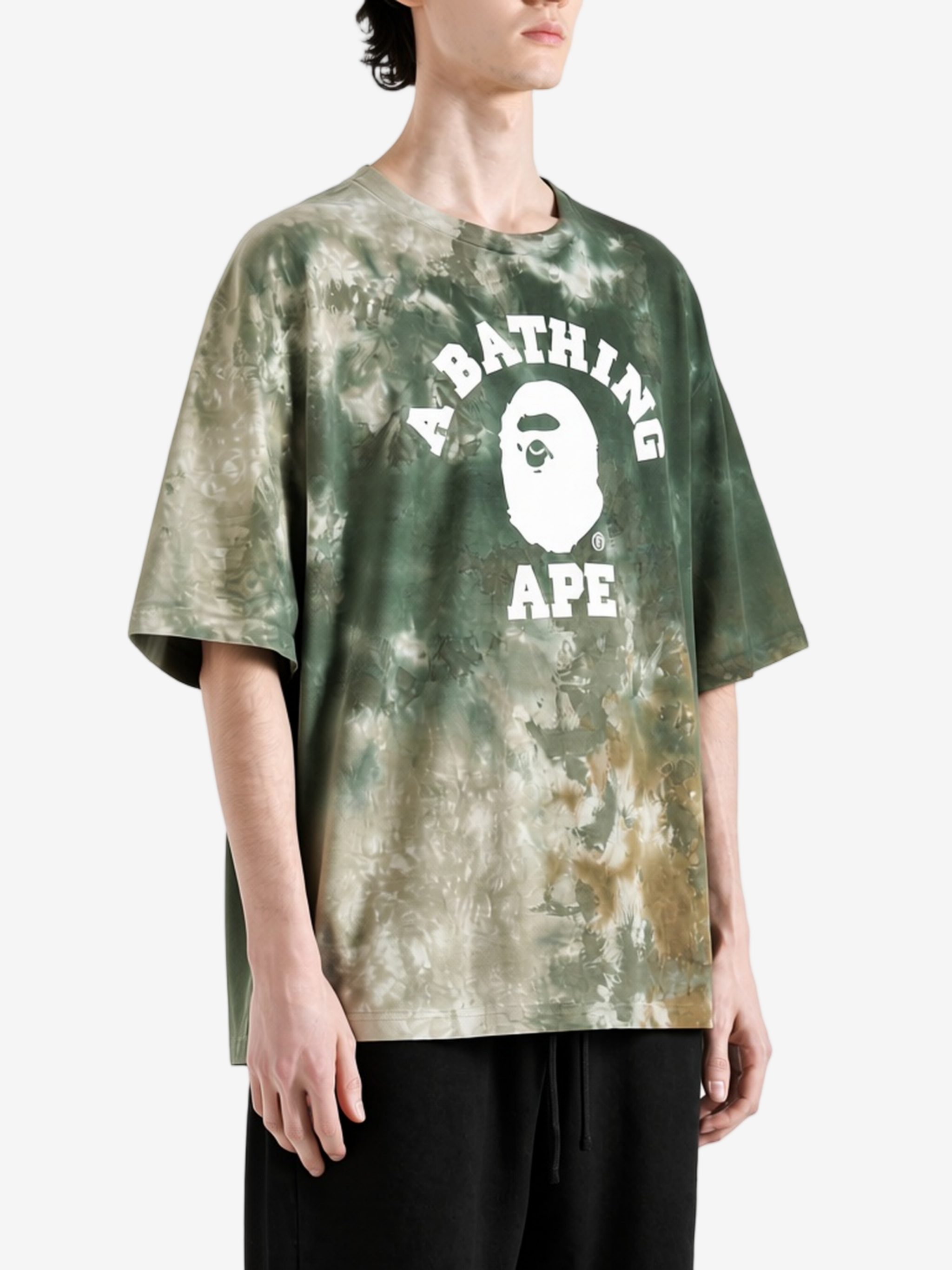 Green t-shirt worn by a person, showing the t-shirt fit