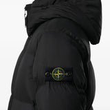 Black jacket worn by a person, showing the jacket fit