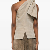 Tan jacktes worn by a person, showing the jacktes fit