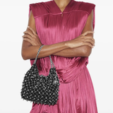 Black bag worn by a person, showing the bag's fit