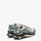 Blue sneakers, side view