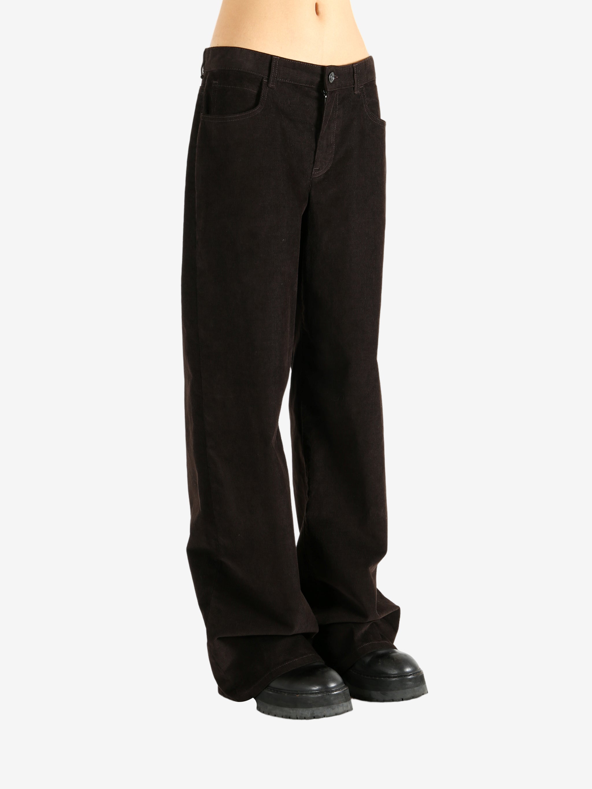 Brown pants worn by a person, showing the pants' fit