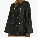 Green jacket worn by a person, showing the jacket's fit