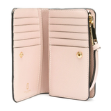 Close up of white bags, showing texture of the leather fabric