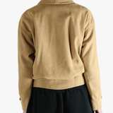 Yellow jacket worn by a person, showing the jacket's fit