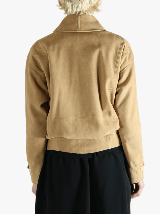 Yellow jacket worn by a person, showing the jacket's fit