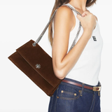 Brown bag worn by a person, showing the bag fit