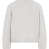 White cardigan, back view