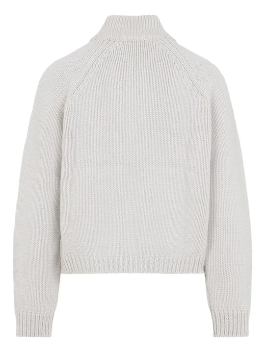 White cardigan, back view