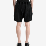 Black shorts, full body view