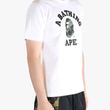 White t-shirt worn by a person, showing the shirt's fit