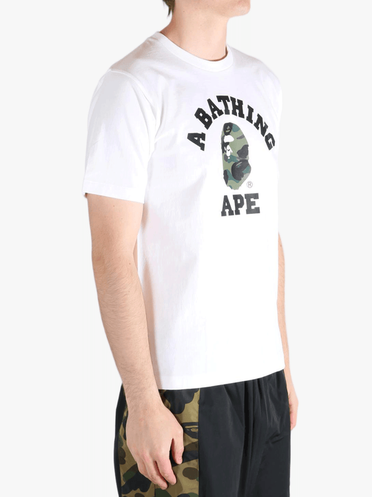 White t-shirt worn by a person, showing the shirt's fit