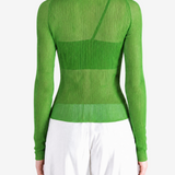 Green shirt worn by a person, showing the shirt fit