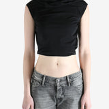 black sleeveless top worn by a person, showing the top fit