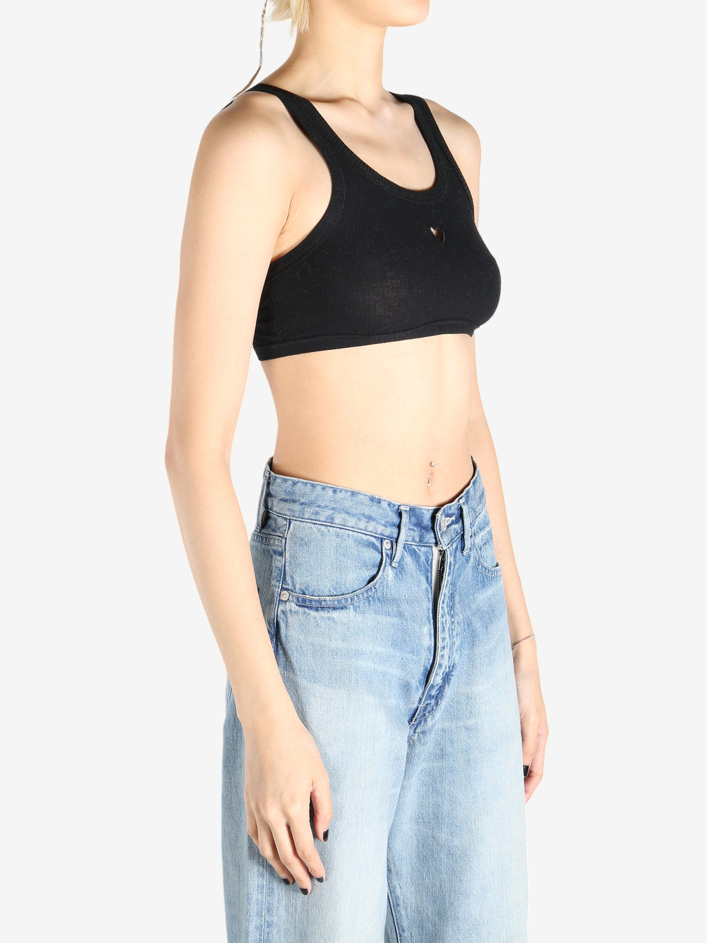 Black bra worn by a person, showing the bra fit