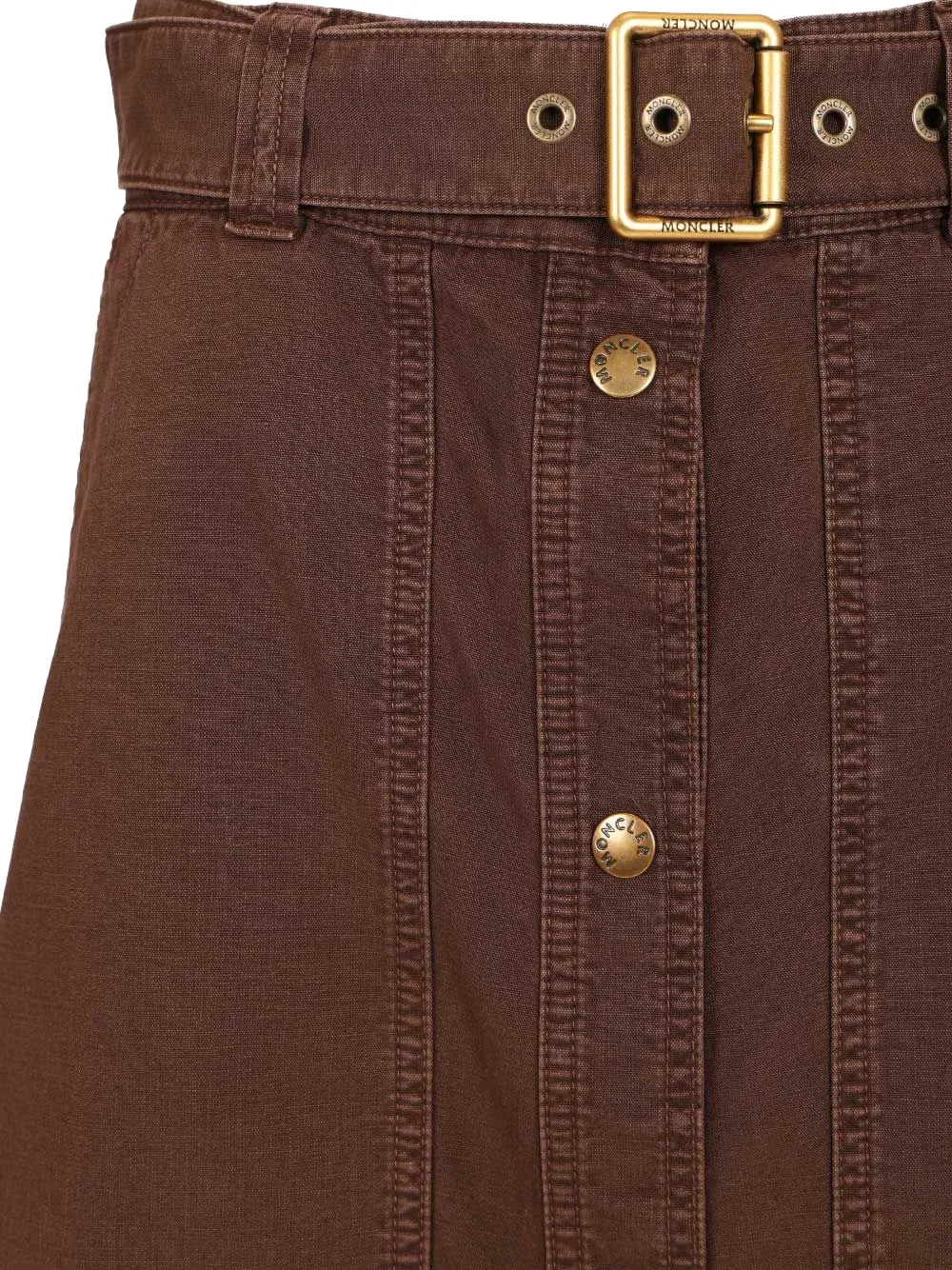 Close up of brown skirt, showing the belt detail.