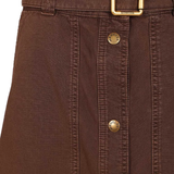 Close up of brown skirt, showing the belt detail.