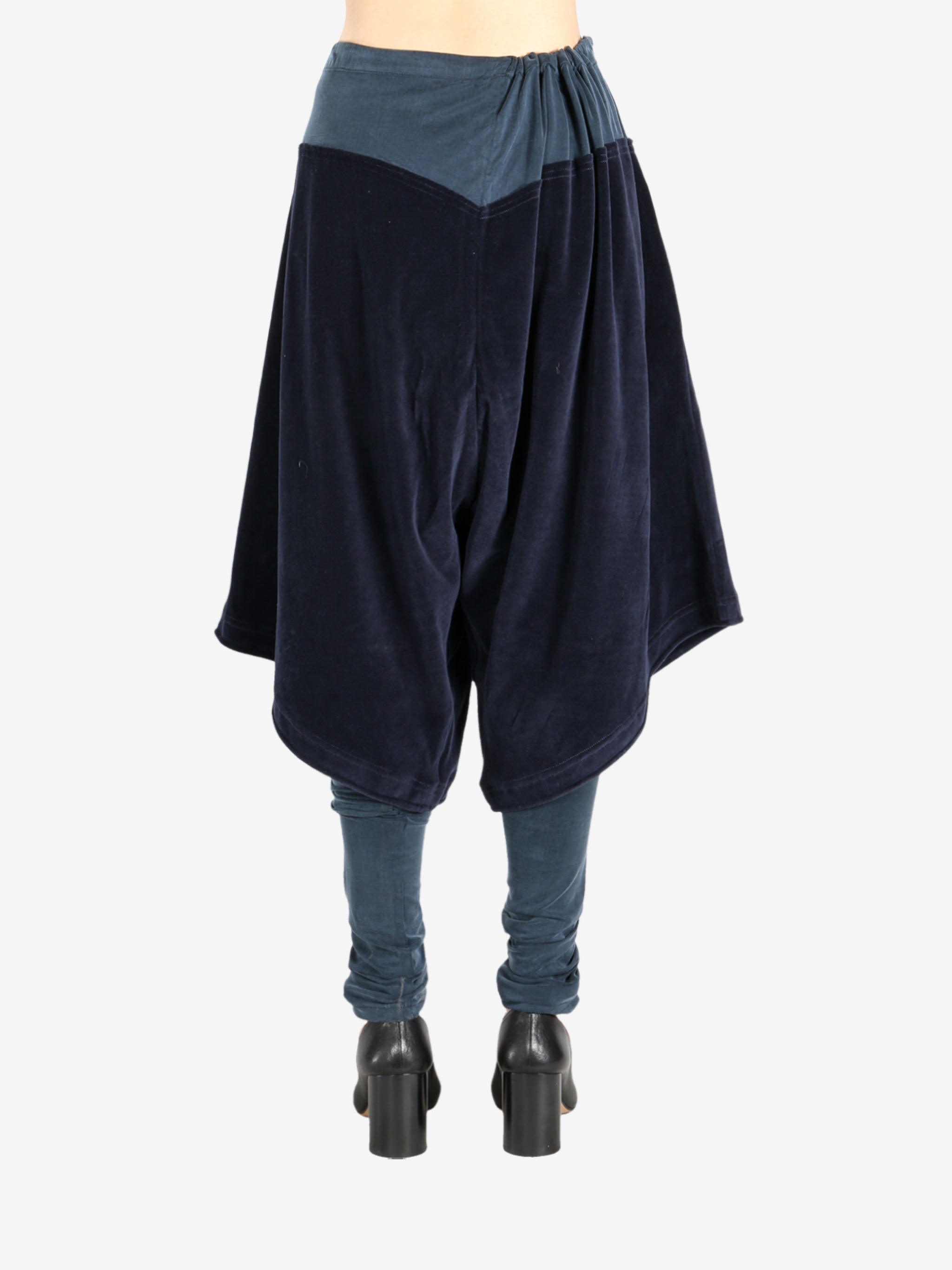 Navy trouser worn by a person, showing the trouser fit