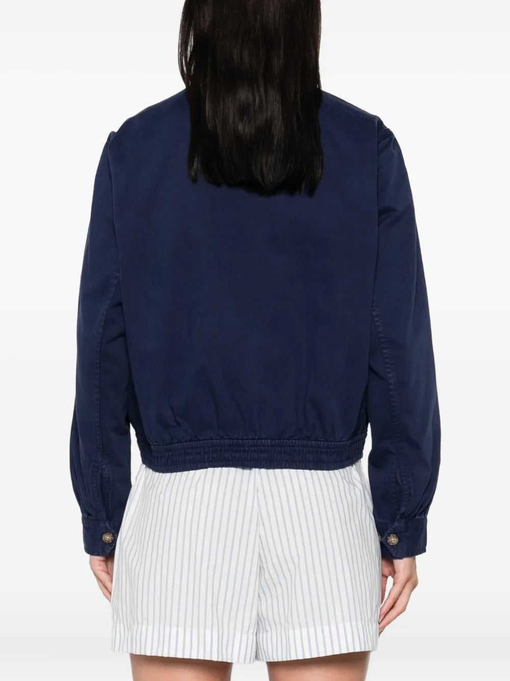 Navy jacket worn by a person, showing the jacket's fit