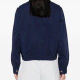 Navy jacket worn by a person, showing the jacket's fit