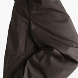 Brown jacket worn by a person, showing the jacket fit