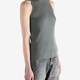 Grey tops worn by a person, showing the tops fit