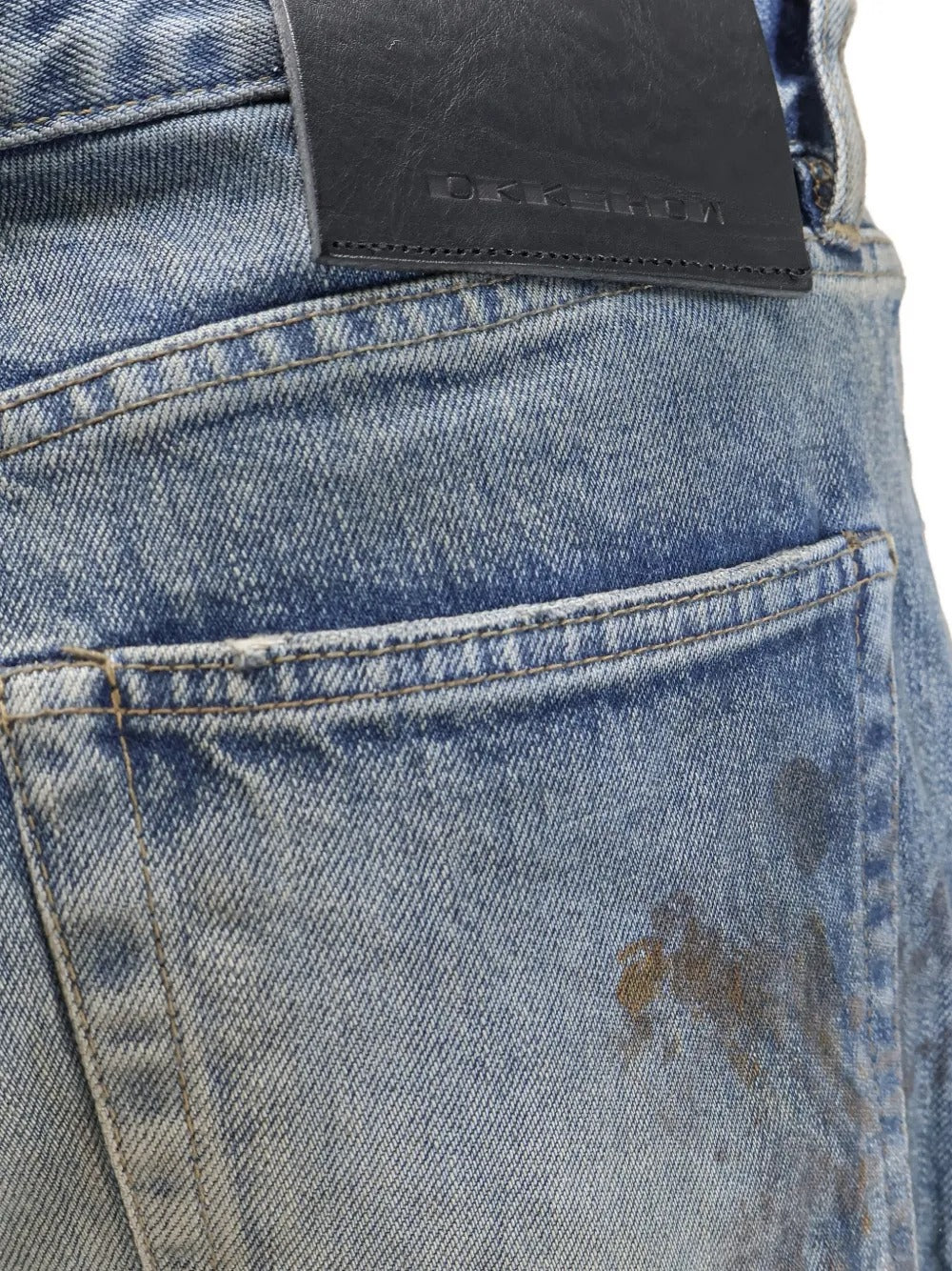 Close up of the blue jeans, showing texture of the cotton fabric