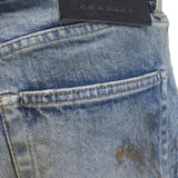 Close up of the blue jeans, showing texture of the cotton fabric