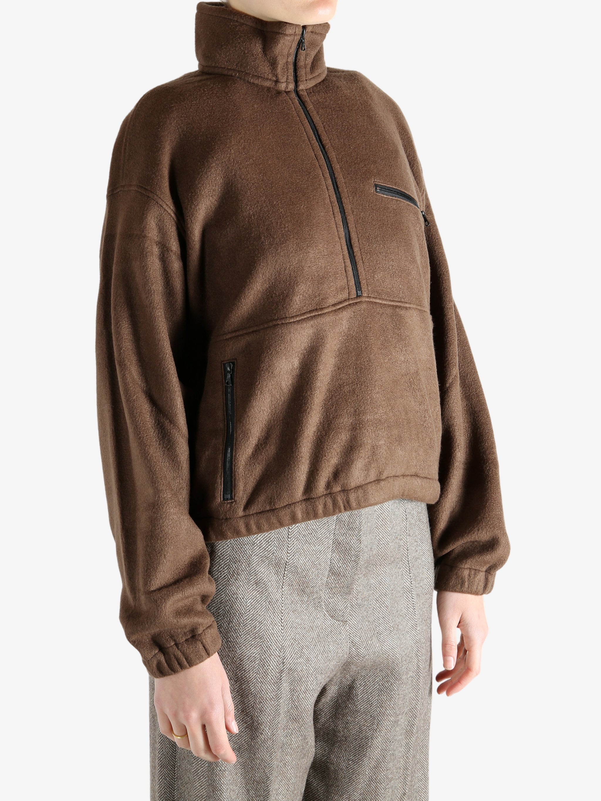 Brown shirts worn by a person, showing the shirts fit