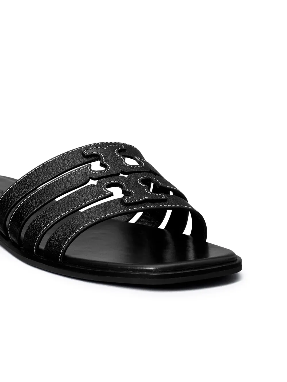 Close up of black sandals, showing texture of the blended fabric