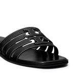 Close up of black sandals, showing texture of the blended fabric
