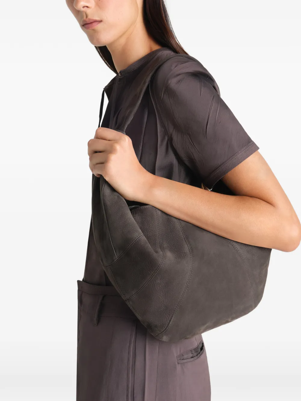 Brown bag worn by a person, showing the bag fit